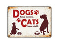 Metallskilt Dogs Have Owners. Cats Have Staff. 21x14,8cm
