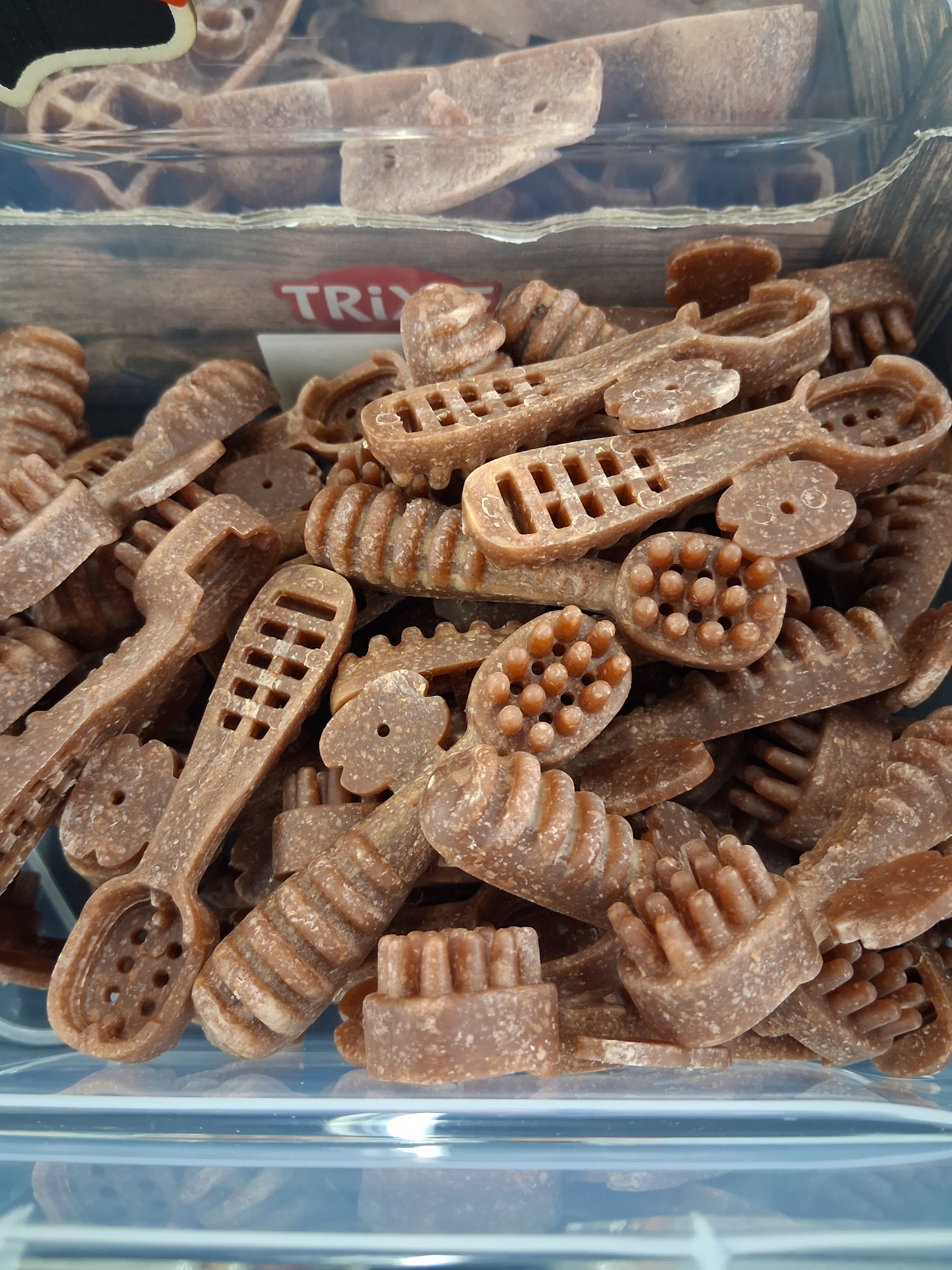 Tygg tannbørste med rom for våtfôr